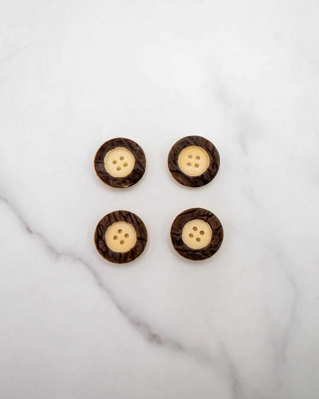 Natural corozo buttons with raised nut skin rim - 22 mm or 7/8