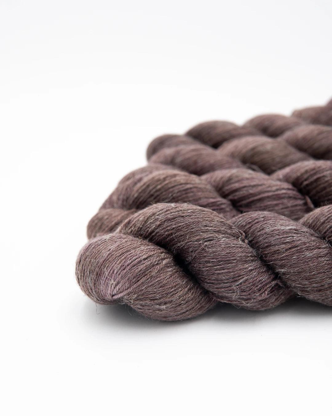 Majyo colorway of organic wool & linen fingering yarn. It's a neutral purple.