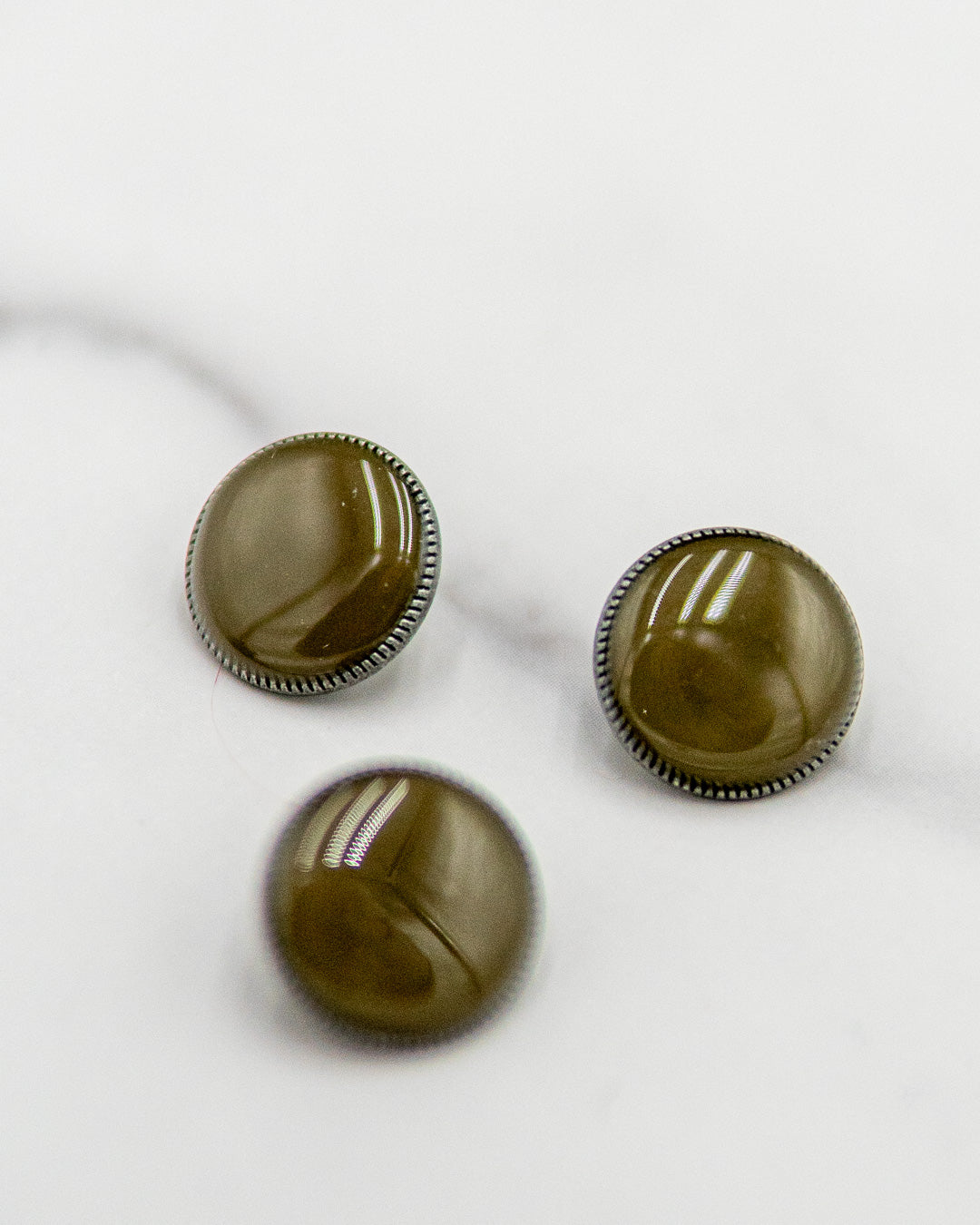 Glossy shanked buttons on metal base - 5/8" / 17 mm