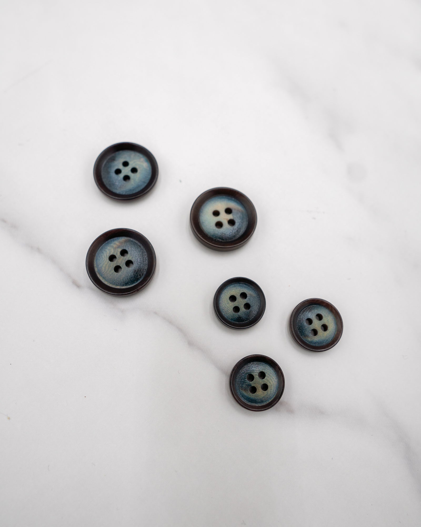 Brown corozo buttons with indigo center - 15 or 20mm - 5/8” or 3/4”