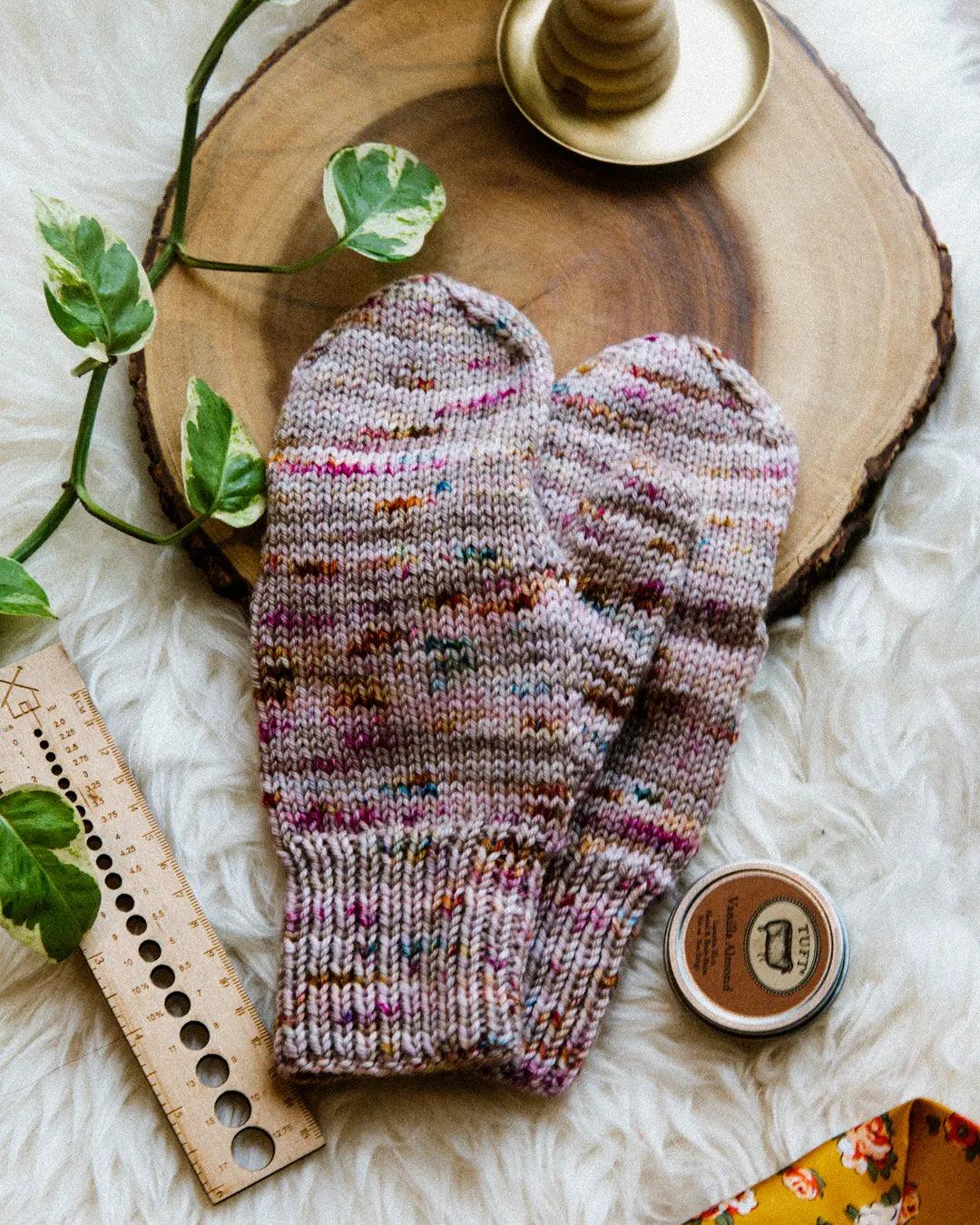 Mitten Knitting pattern product photo with pink speckles.